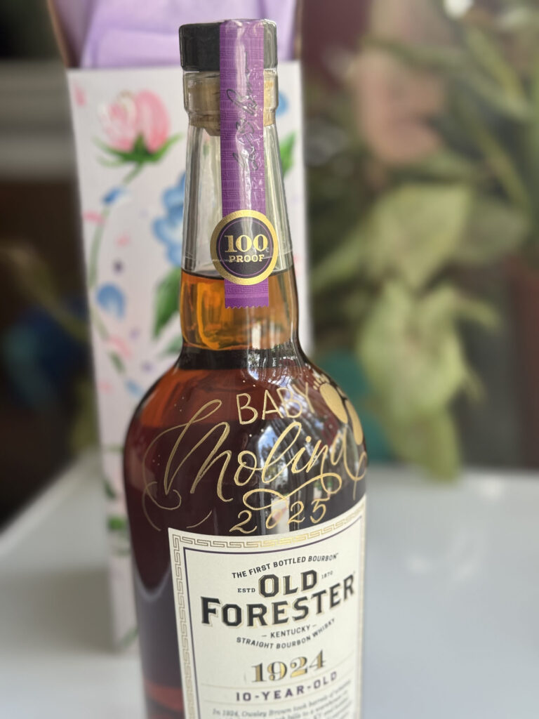 Custom engraved and painted by KeeKee Creates on a liquor bottle.