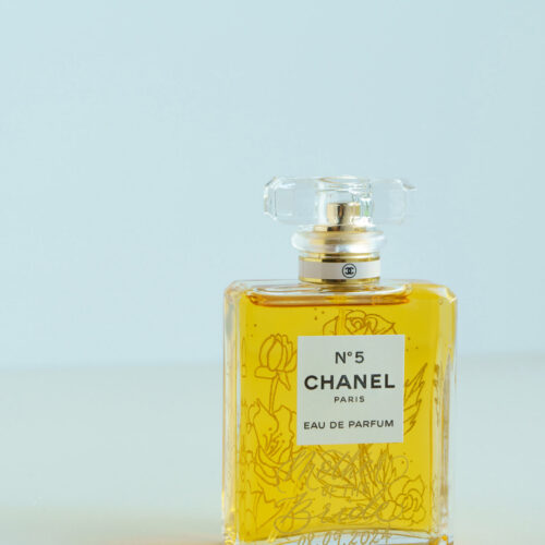 Engraved Chanel No. 5 with floral design filled with gold by KeeKee Creates.