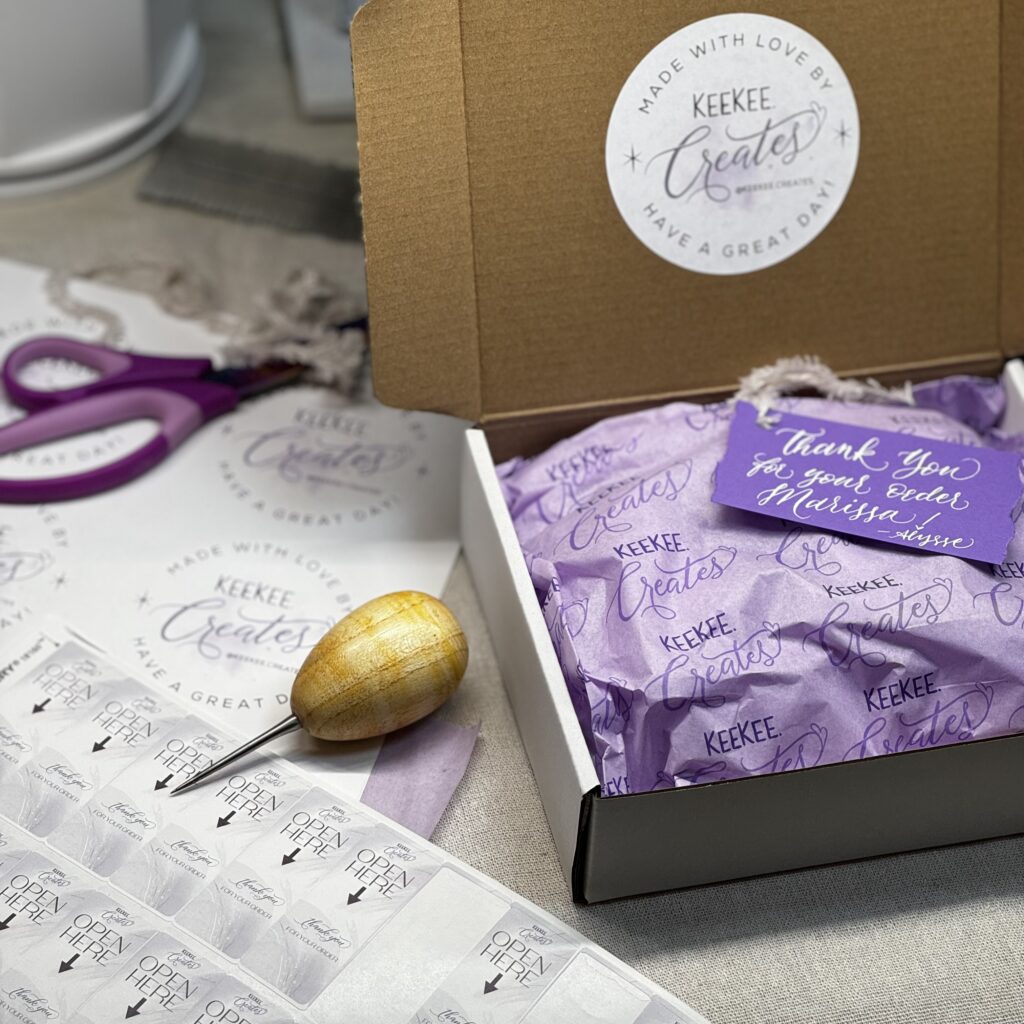 KeeKee Creates custom calligraphy and packaging services by Alysse Speiginer, featuring personalized boxes, tissue paper, and gift tags in Orange County studio