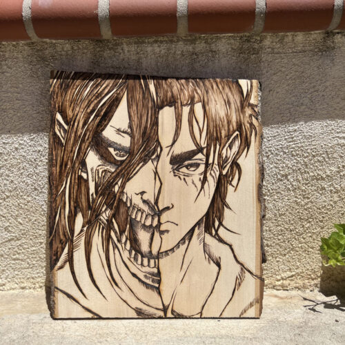 Intricate wood-burned artwork by KeeKee Creates featuring a detailed anime character portrait with long hair